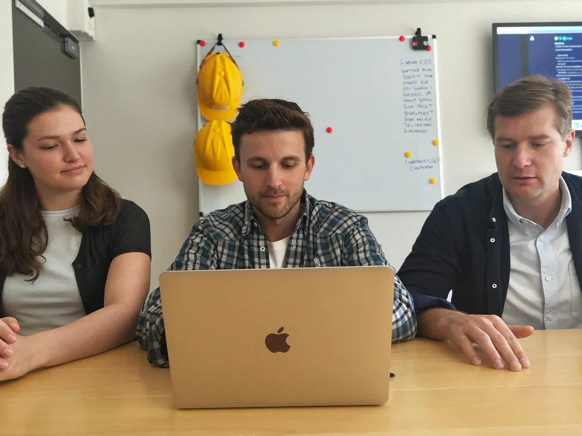 A weekly numbers review at the site office