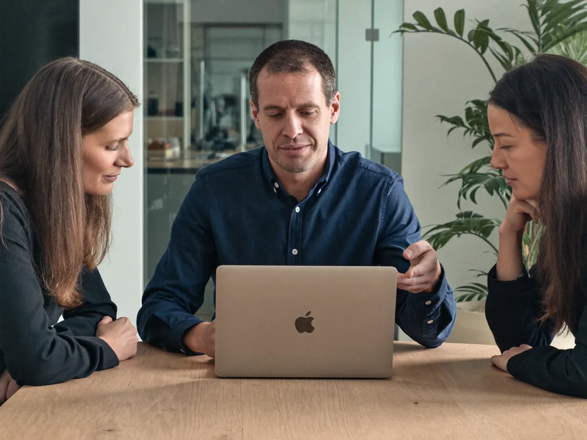 A weekly numbers review over a laptop